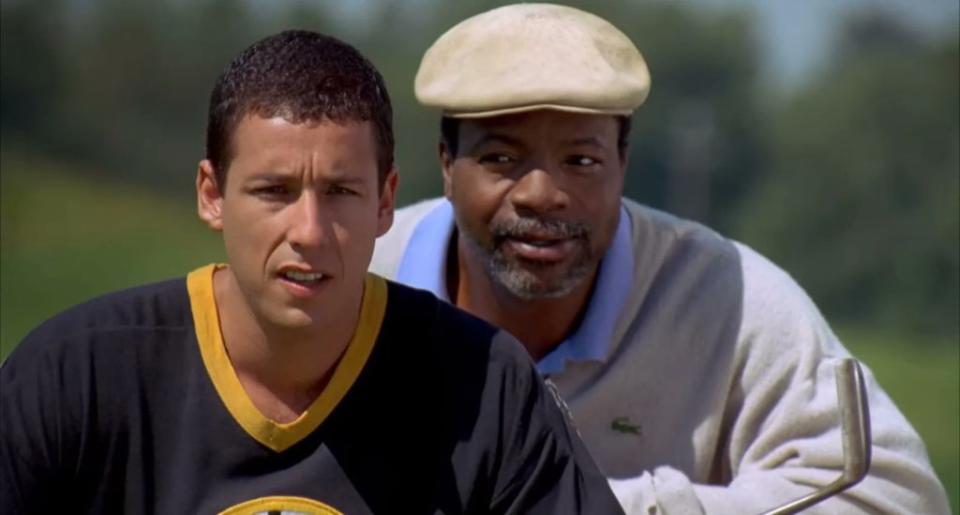Adam Sandler as Happy Gilmore and Carl Weathers as Happy’s coach, “Chubbs” Peterson, in “Happy Gilmore.”