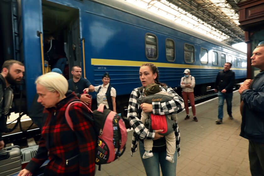 DNIPRO TO LVIV, Ukraine-April 30, 2022-Scene from the train station in Lviv on train arrival from Dnipro, a 22-hour trip. On April 29, 2022, the train from Dnipro, Ukraine to Lviv, Ukraine was a 22-hour overnight journey. Scene out the train window on trip from Dnipro to Lviv, Ukraine on April 29, 2022. (Carolyn Cole / Los Angeles Times)