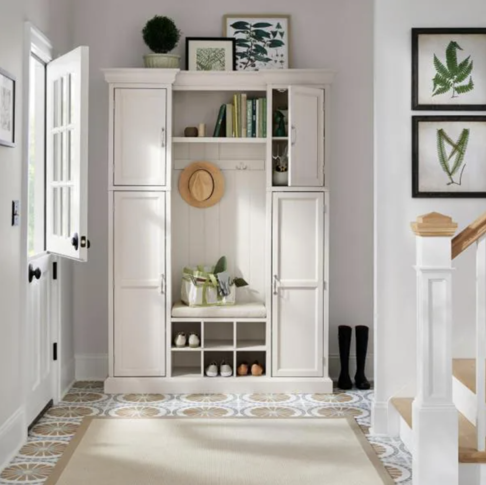 White Home Depot Hall Tree with shelf, cubbies for shoes, and bench seat