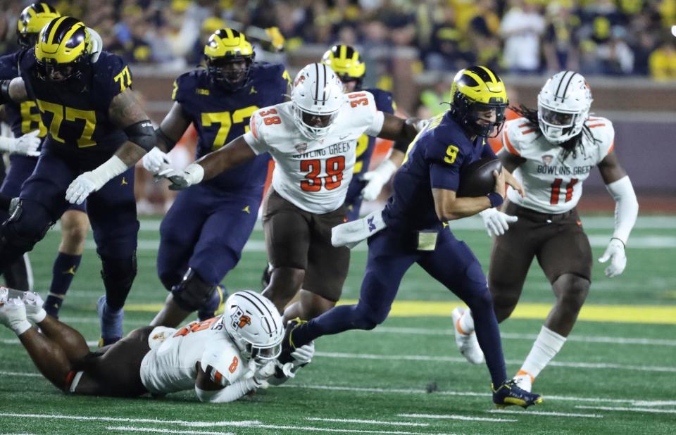 Michigan quarterback J.J. McCarthy is pressured by Bowling Green during the second half of Michigan's 31-6 win on Saturday, Sept. 16 2023, in Ann Arbor.