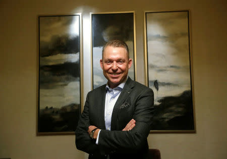 Andreas Schaaf, China head of General Motor's Cadillac premium brand, poses for a photo ahead of a Reuters interview in Beijing, China, January 17, 2017. REUTERS/Jason Lee