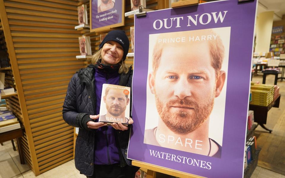 Caroline Lennon, the first and only customer in the queue to purchase a copy of Spare - James Manning