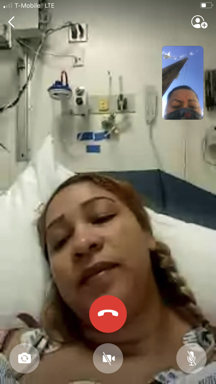 In this FaceTime screen grab made by Janeth, Arely is seen in her hospital bed at Johns Hopkins Hospital after having breathing problems and being diagnosed with COVID-19, Thursday May 7, 2020, in Baltimore. Having stayed only in her home for months she has no idea how she contracted the virus. (Janeth via AP)