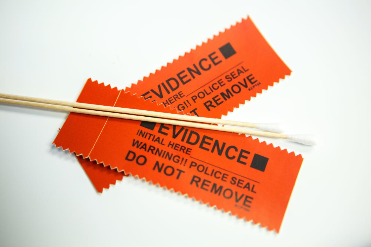 In this 2018 photo, swabs and evidence tags that are part of a rape kit sit on a table in one of the YWCA's exam rooms in Oklahoma City. A recent security breach at a company the Oklahoma City Police Department used to process rape kits may have compromised personal and medical information of sexual assault victims.