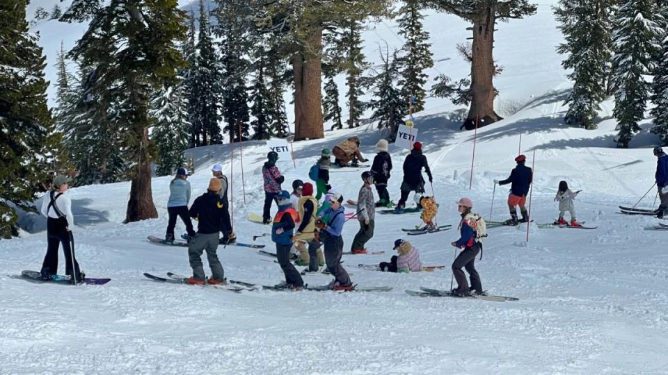 Snow golfers eagerly await their turn for the tee box.<p>Photo: Matt Lorelli</p>