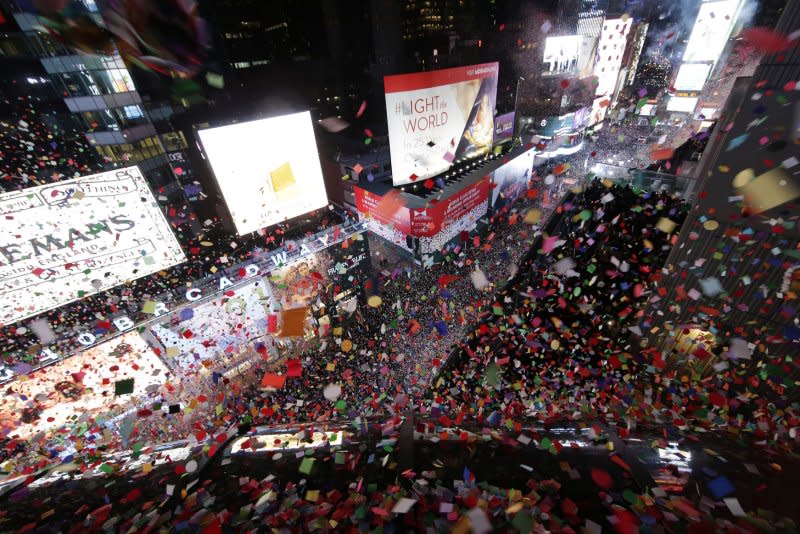 Confetti falls after midnight from a roof overlooking Times Square to bring in the new 2017 on New Year's Eve in New York City on January 1, 2017. In 45 B.C., New Year's Day was celebrated on January 1 for the first time as the Julian calendar took effect. File Photo by John Angelillo/UPI