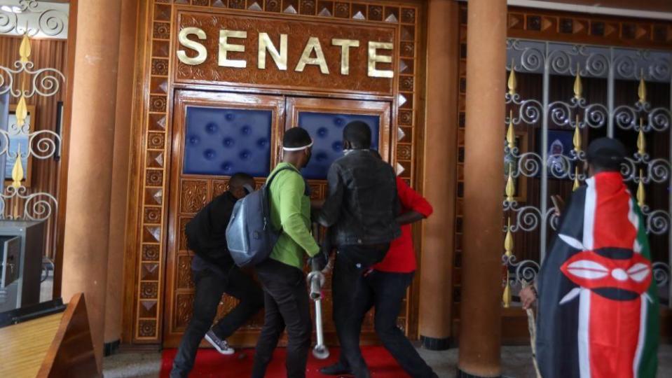 Protesters storm parliament during a protest against tax hikes in Nairobi, Kenya, June 25, 2024.