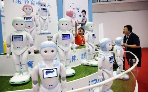 Teaching robots on display at the World Robot Conference in Beijing - Credit: Getty