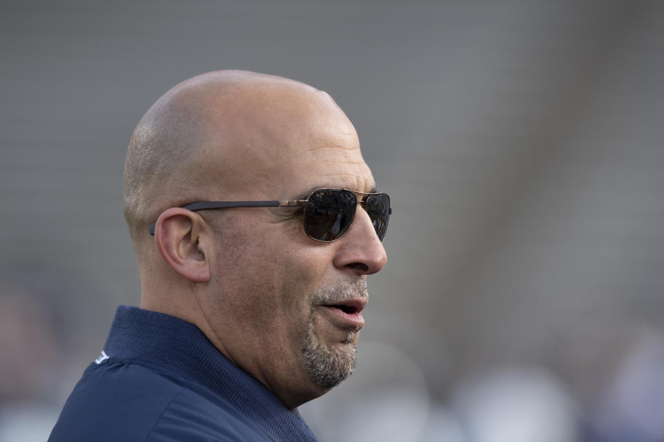 Penn State head coach James Franklin watches his team warm up for an NCAA college football game against Rutgers in State College, Pa., on Saturday, Nov. 30, 2019. (AP Photo/Barry Reeger)