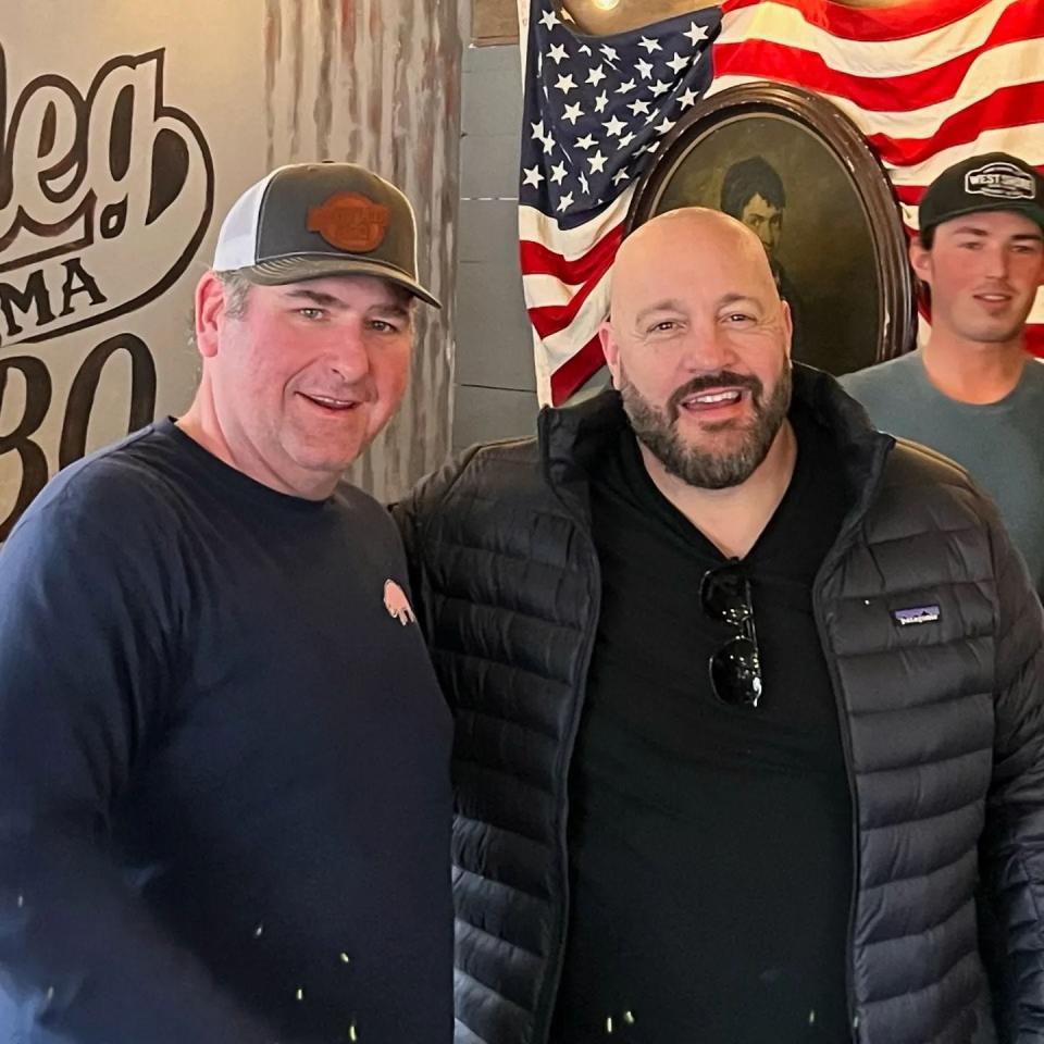 Bootleg BBQ owner Fred Melnyk poses with actor and comedian Kevin James, who stopped by the Westport restaurant on Thursday, Feb. 16, 2023.