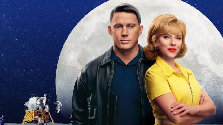 Channing Tatum and Scarlett Johansson smiling and posing with the moon in the background in a promo image for the film Fly Me to the Moon.