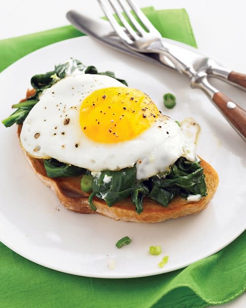 <div class="caption-credit"> Photo by: Everyday Food</div><b>Easy Eggs Florentine</b> <br> <br> Use up extra sautéed greens in our take on Eggs Florentine. No need to mess with poached eggs or complex sauces -- instead, the eggs are quick-fried, and crumbled goat cheese adds a layer of flavor. <br> <a rel="nofollow noopener" href="http://www.marthastewart.com/315483/easy-eggs-florentine-with-baby-spinach-a?xsc=synd_yshine" target="_blank" data-ylk="slk:Get the Easy Eggs Florentine with Goat Cheese and Spinach Recipe;elm:context_link;itc:0;sec:content-canvas" class="link "><b><br> Get the Easy Eggs Florentine with Goat Cheese and Spinach Recipe</b></a> <br>