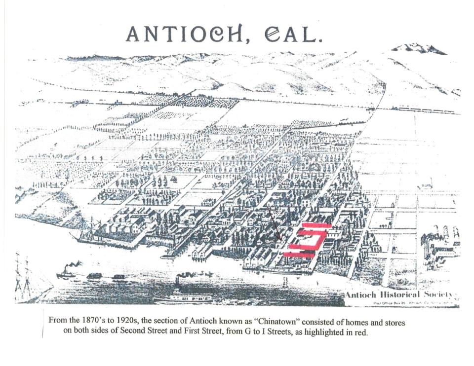 An old sketched map of a city with red lines marking the Chinatown area