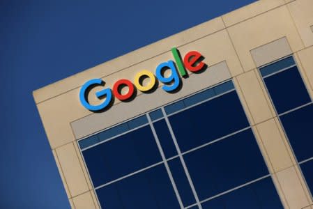 FILE PHOTO - The Google logo is pictured atop an office building in Irvine, California, U.S. August 7, 2017.   REUTERS/Mike Blake/File Photo