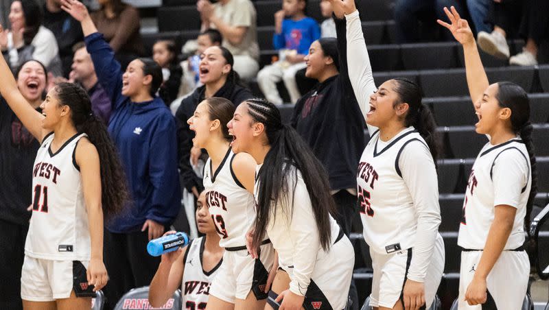 The West Panthers cheer for their teammates during a game against the Salem Hills Skyhawks at West High School in Salt Lake City on Thursday, Feb. 22, 2024.