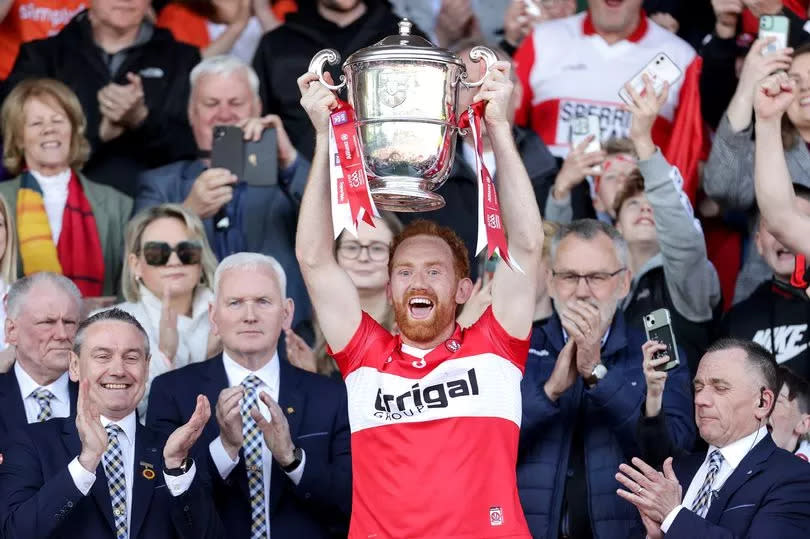 Derry's Conor Glass lifts the Anglo Celt Cup following their Ulster SFC final win over Armagh in Clones