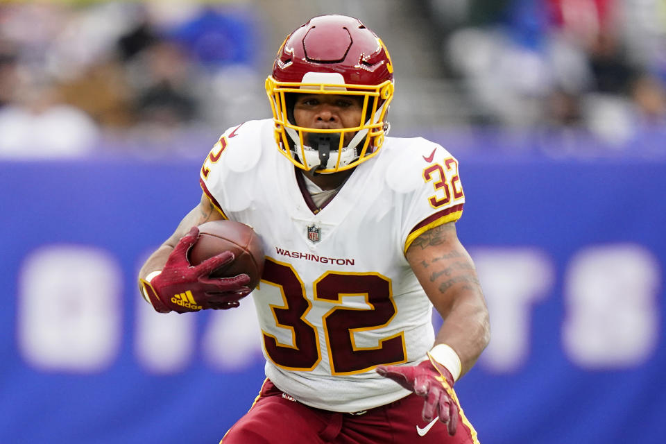 Washington Football Team running back Jaret Patterson (32) runs the ball against the New York Giants during the second quarter of an NFL football game, Sunday, Jan. 9, 2022, in East Rutherford, N.J. (AP Photo/Frank Franklin II)