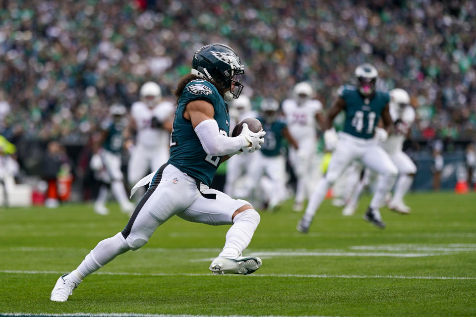 Philadelphia Eagles safety Sydney Brown runs with the ball after intercepting a pass from Arizona Cardinals quarterback Kyler Murray during the first half of an NFL football game, Sunday, Dec. 31, 2023, in Philadelphia. Brown returned the ball for a touchdown on the play. (AP Photo/Matt Slocum)