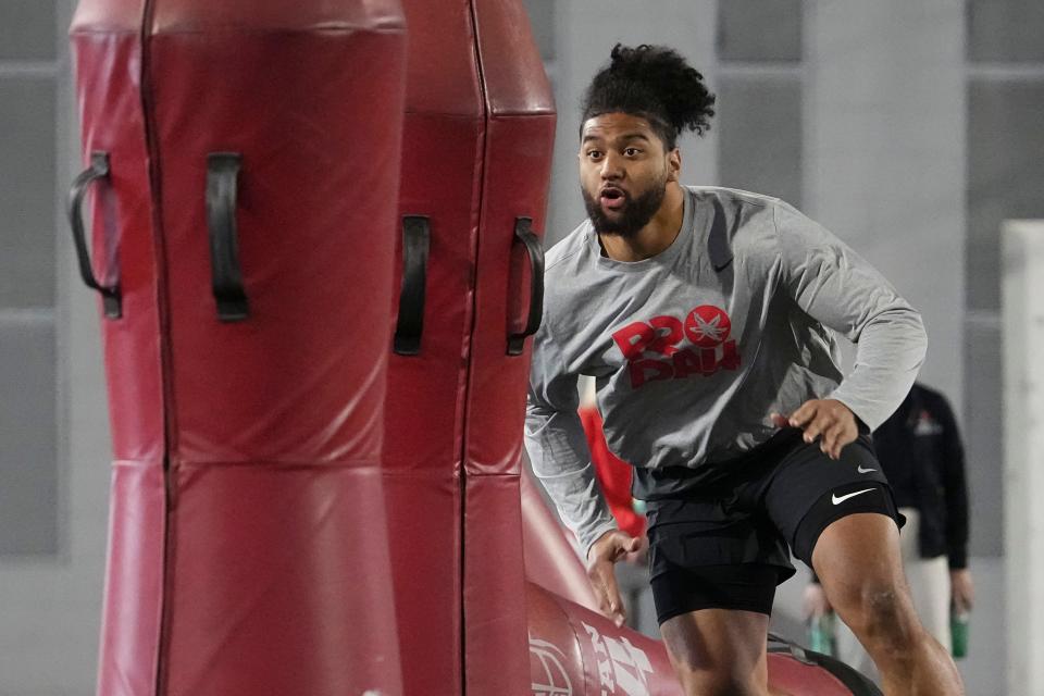 Mar 20, 2024; Columbus, Ohio, USA; Ohio State Buckeyes defensive end JT Tuimoloau runs through drills during Pro Day at the Woody Hayes Athletic Center.