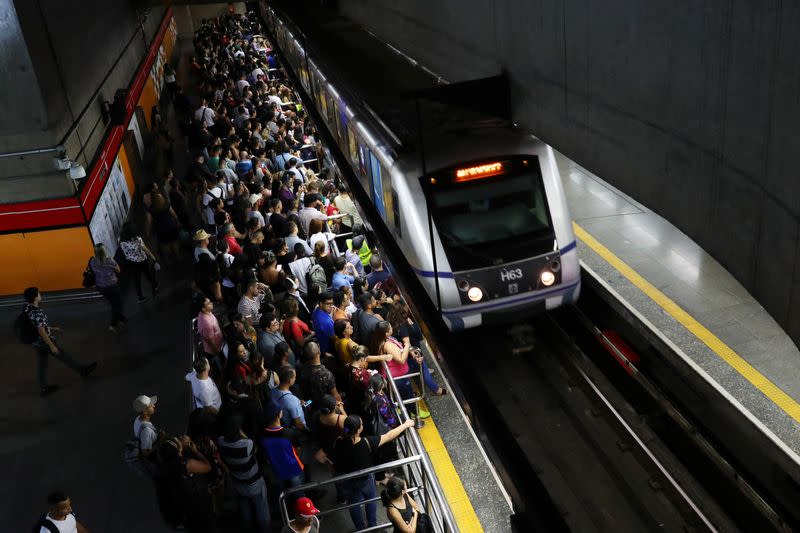 People gather at Se subway station amid the coronavirus disease (COVID-19) outbreak in Sao Paulo