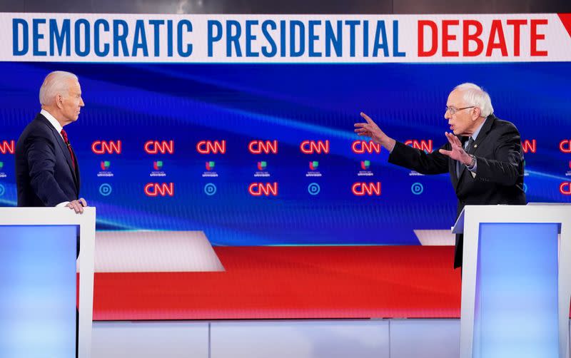 Democratic U.S. presidential candidates Senator Bernie Sanders and former Vice President Joe Biden at the 11th Democratic candidates debate of the 2020 U.S. presidential campaign in Washington