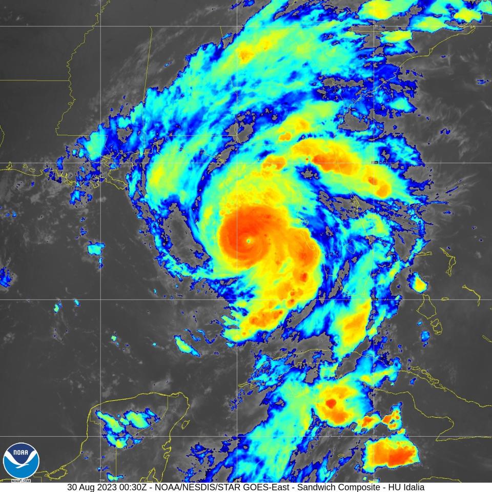 Hurricane Idalia's rain bands span Florida as the hurricane strengthens and heads toward a landfall near the state's Big Bend region, in this color-enhanced satellite image from the National Oceanic and Atmospheric Administration, taken at 9 p.m. Aug. 29, 2023.