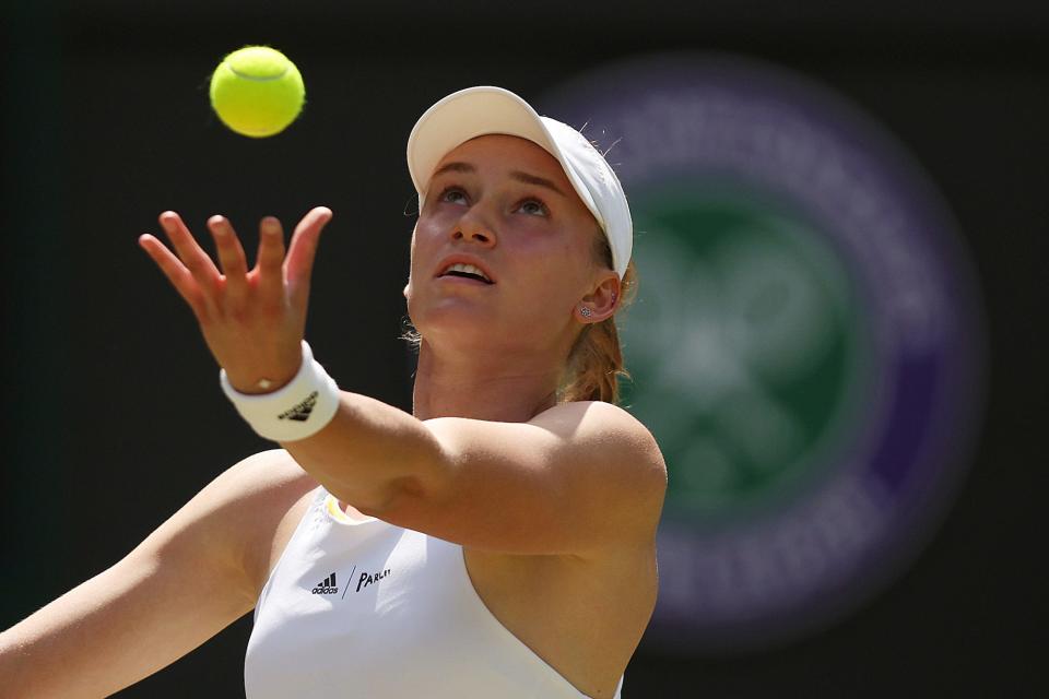 Elena Rybakina of Kazakhstan serves against Petra Martic of Croatia during their Women's Singles Fourth Round match on day eight of The Championships Wimbledon 2022 at All England Lawn Tennis and Croquet Club