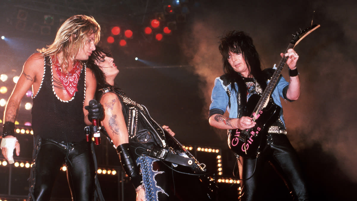  Mick Mars (right) performs onstage with Mötley Crüe 