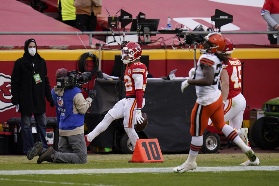 Kansas City Chiefs safety Tyrann Mathieu (32) celebrates after intercepting a pass during the second half of an NFL divisional round football game against the Cleveland Browns, Sunday, Jan. 17, 2021, in Kansas City. (AP Photo/Jeff Roberson)