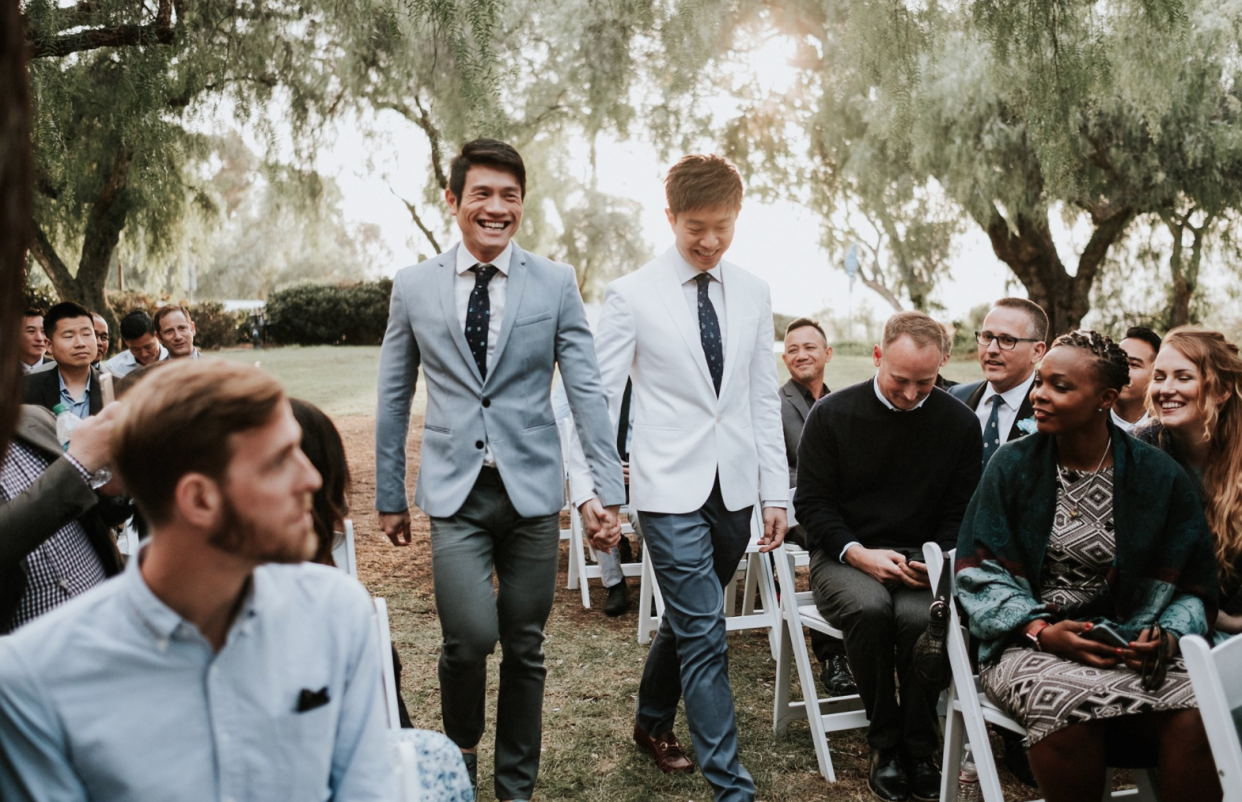 Caleb Goh (right) and his partner at their wedding ceremony in December 2017. (Photo: Caleb Goh/Twitter)