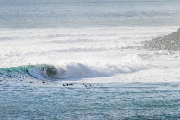 An unidentified surfer, hanging on by his toes.<p>Ryan "Chachi" Craig</p>