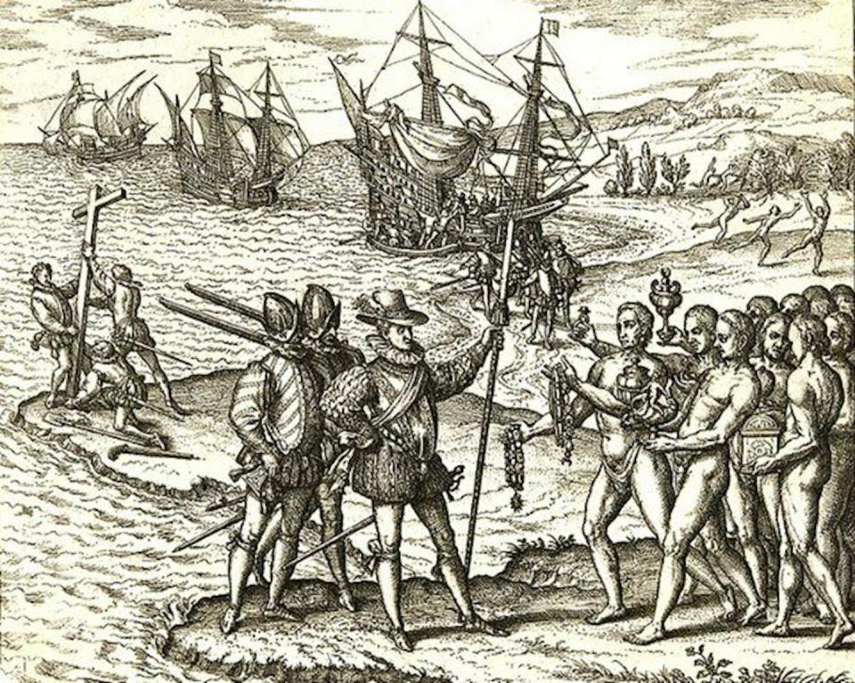 This 16th century engraving shows Christopher Columbus landing in the Americas, where he and his explorers deemed the Indigenous people there as ‘primitive,’ as they had no writing system. <a href="https://commons.wikimedia.org/wiki/File:Columbus_landing_on_Hispaniola.JPG" rel="nofollow noopener" target="_blank" data-ylk="slk:Theodor de Bry/Wikimedia Commons;elm:context_link;itc:0;sec:content-canvas" class="link ">Theodor de Bry/Wikimedia Commons</a>