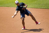 Washington Nationals' Wilmer Difo (1) fields a ball as the Washington Nationals hold their first baseball training camp work out at Nationals Stadium, Friday, July 3, 2020, in Washington. (AP Photo/Andrew Harnik)