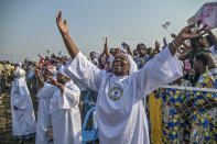 Worshipers greet Pope Francis as he arrives at Ndolo airport to celebrate Holy Mass, in Kinshasa, Congo, Wednesday Feb. 1, 2023. Francis is in Congo and South Sudan for a six-day trip, hoping to bring comfort and encouragement to two countries that have been riven by poverty, conflicts and what he calls a "colonialist mentality" that has exploited Africa for centuries. (AP Photo/Moses Sawasawa)