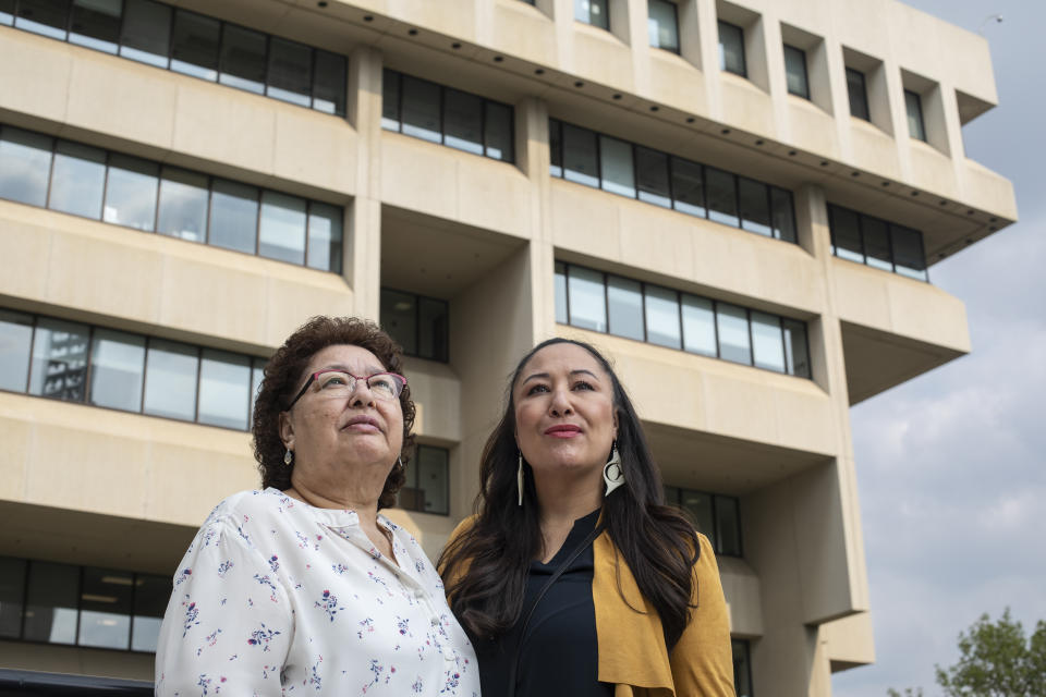 May Sarah Cardinal and her daughter, Anita Cardinal, stand for a portrait outside the Law Courts building in Edmonton, Alberta, Canada on Thursday, May 25, 2023. There are at least five class-action lawsuits against health, provincial and federal authorities involving forced sterilizations in Alberta, Saskatchewan, Quebec, British Columbia, Manitoba, Ontario and elsewhere. May Sarah is the representative plaintiff in the Alberta class action. (AP Photo/Amber Bracken)