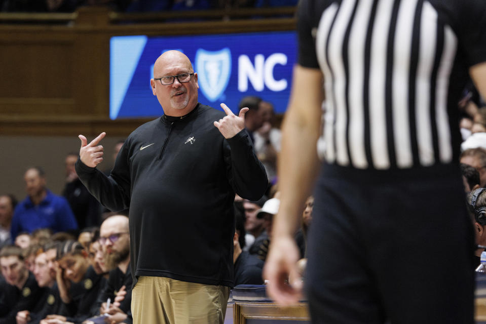 Wake Forest head coach Steve Forbes, left, reacts after a call during the second half of an NCAA college basketball game against Duke in Durham, N.C., Monday, Feb. 12, 2024. (AP Photo/Ben McKeown)