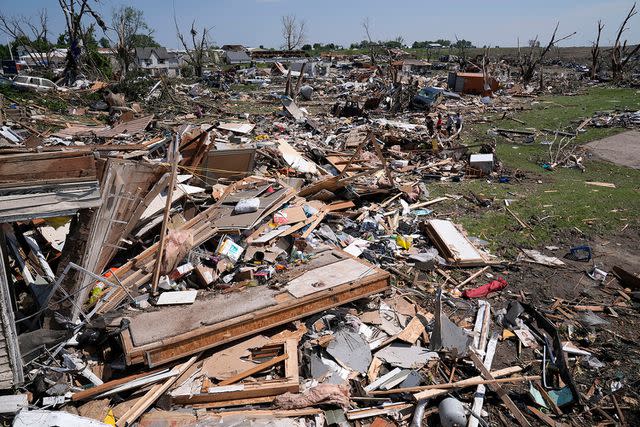 <p>AP Photo/Charlie Neibergall</p> Damage from the tornado that hit Greenfield, Iowa on Tuesday, May 21