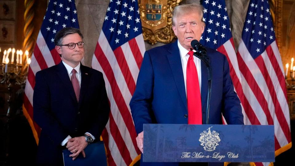 PHOTO: Republican presidential candidate former President Donald Trump speaks as Speaker of the House Mike Johnson, listens during a news conference, April 12, 2024, at Mar-a-Lago in Palm Beach, Fla. (Wilfredo Lee/AP)