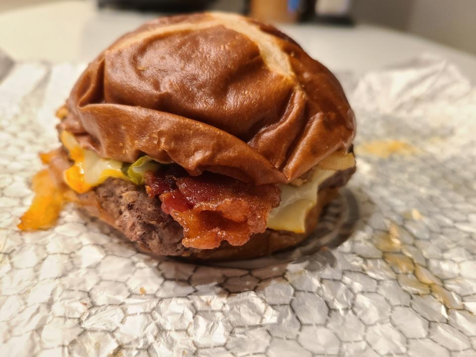 wendys pretzel bacon pub cheeseburger on white wrapper