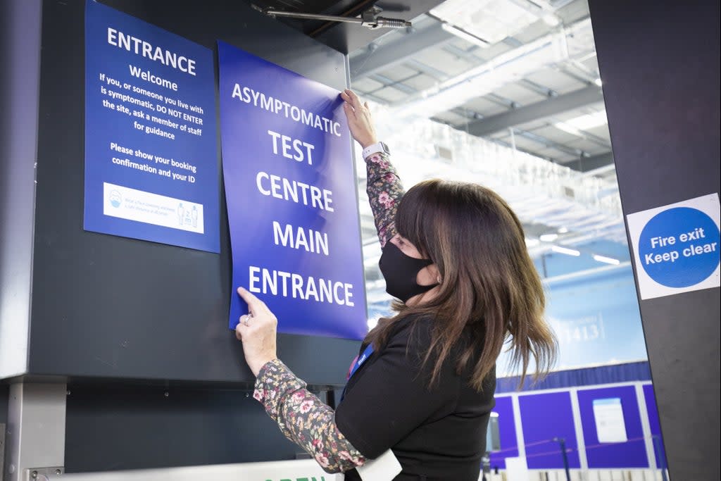 Students get a Covid-19 test at a mass testing centre set up at the sports centre at St Andrews University, ahead of the Christmas holiday (PA)