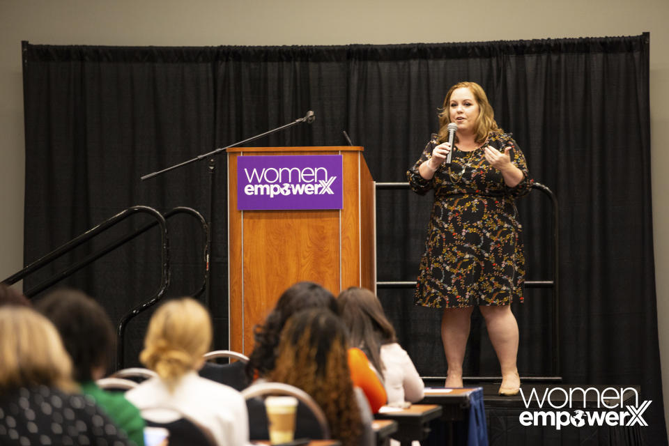 Rita Goodroe addressing an audience at the Women Empower X Expo at the Walter E. Washington Convention Center in Washington, D.C., in June 2019. While Goodroe pivoted years ago to an entrepreneur’s life, the pandemic’s Great Resignation has produced a Great Reinvention as more people of all ages have given up on jobs and find themselves pondering the work-life balance that lends meaning to their lives. (Viviana Garcia via AP)