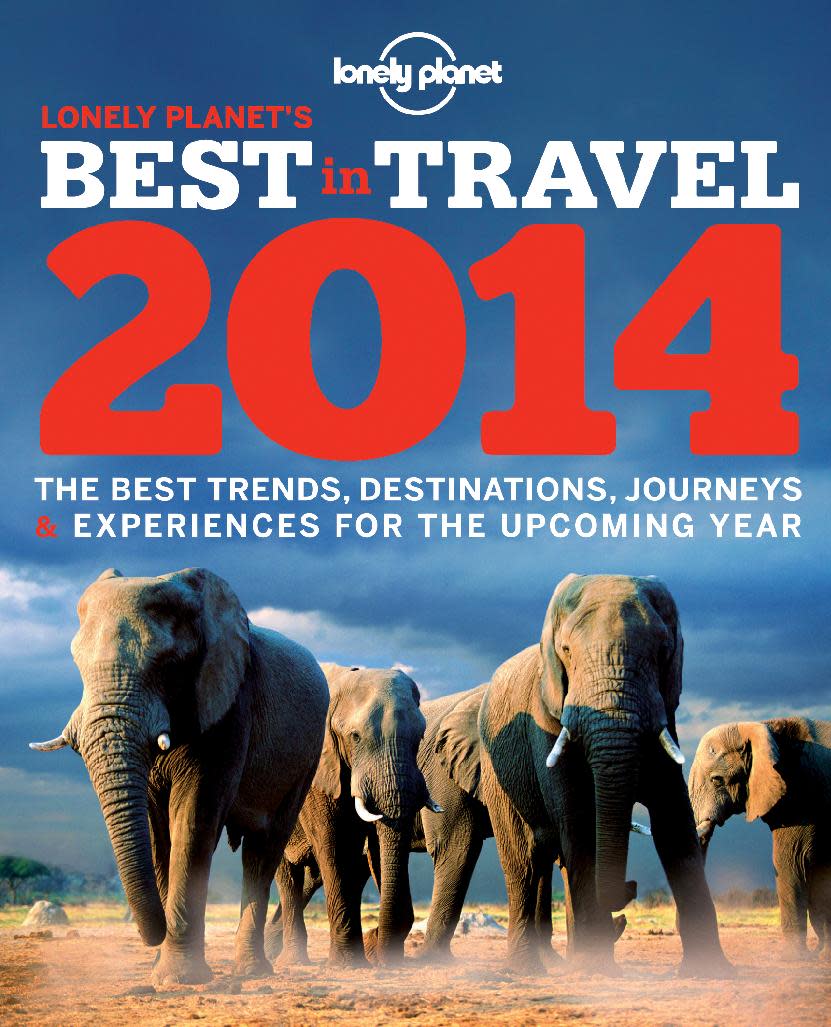 This image provided by Lonely Planet shows the cover of the travel guidebook company’s book “Best in Travel 2014,” an annual guide to trends, destinations, journeys and experiences for the new year. (AP Photo/Lonely Planet)
