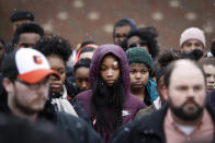 <p>Students gather on their soccer field during a 17-minute walkout protest at the Stivers School for the Arts, Wednesday, March 14, 2018, in Dayton, Ohio. Students across the country planned to participate in walkouts Wednesday to protest gun violence, one month after the deadly shooting inside a high school in Parkland, Fla. (Photo: John Minchillo/AP) </p>