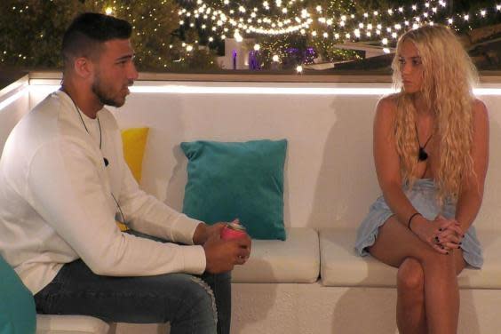 Lucie Donlan and Tommy Fury chat on the third episode of Love Island. (Photo by ITV/REX)