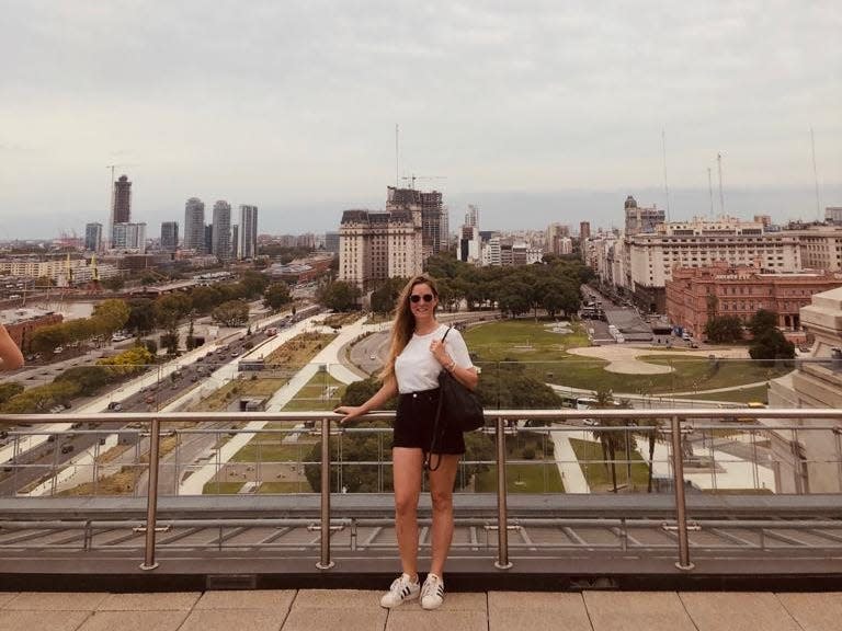 jordan mautner standing on bridge in Buenos Aires