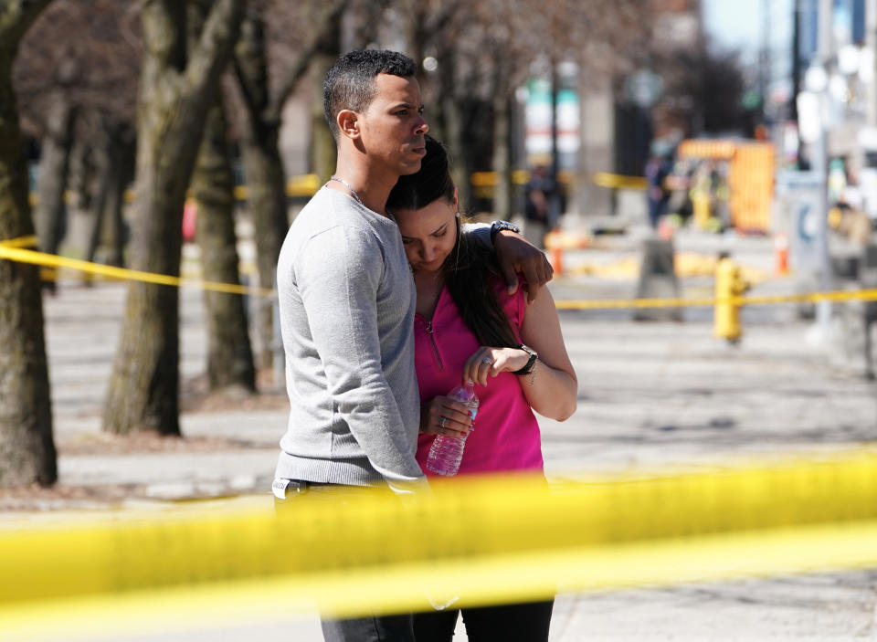 People react&nbsp;near the scene of the crash.&nbsp;