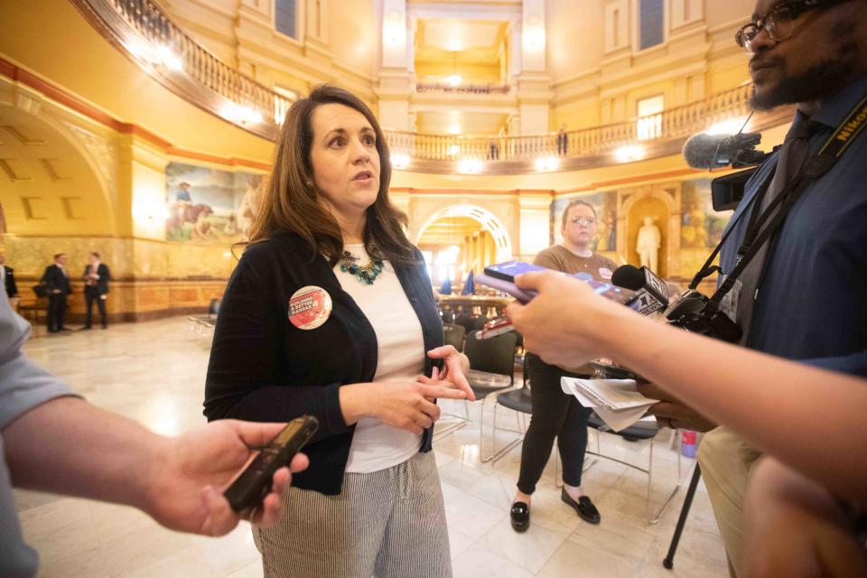 Emily Wales, president and CEO of Planned Parenthood Great Plains Votes, talks with media following an abortion-rights rally at the Statehouse.