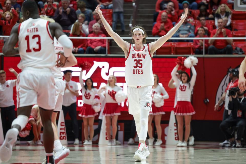 Utah Utes center Branden Carlson (35) hypes up the crowd after sinking a three during the game against the Utah Valley Wolverines at the Huntsman Center in Salt Lake City on Saturday, Dec. 16, 2023. | Spenser Heaps, Deseret News
