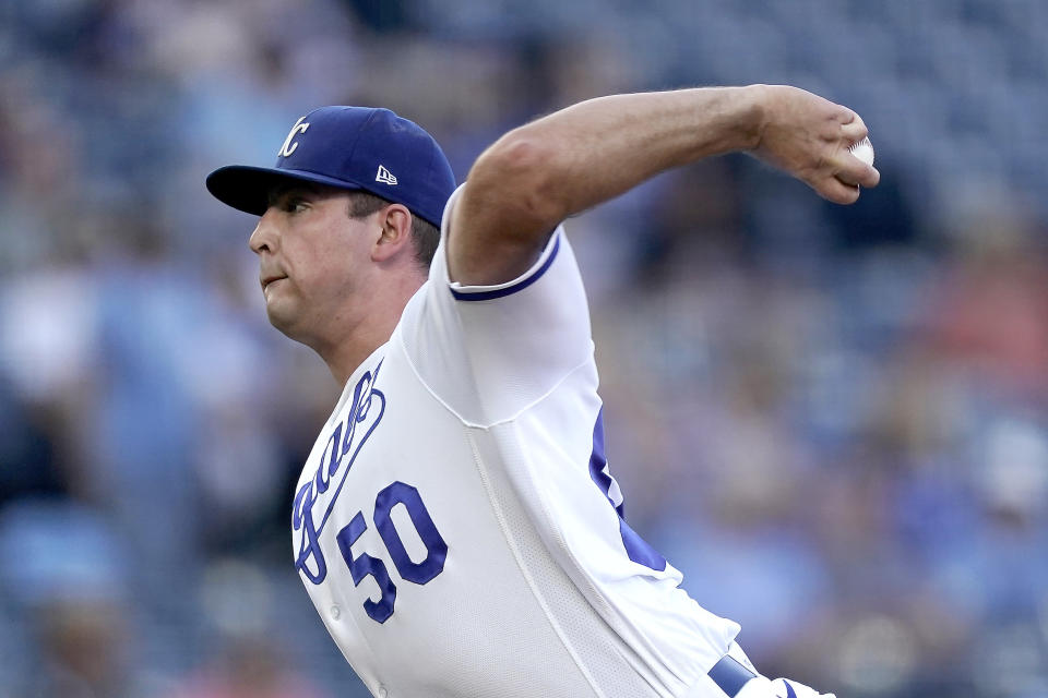 Kansas City Royals starting pitcher Kris Bubic throws during the first inning of a baseball game against the Chicago White Sox Wednesday, Aug. 10, 2022, in Kansas City, Mo. (AP Photo/Charlie Riedel)