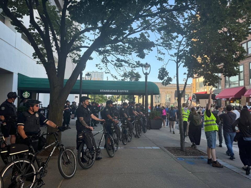Police surround the Hyatt Regency hotel in Milwaukee as protesters arrive on Thursday, July 18, 2024.